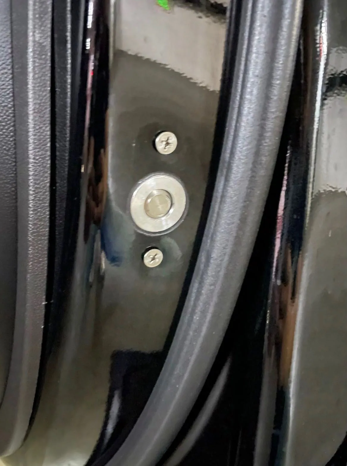 Armored Escalade — reinforced door lock and latch